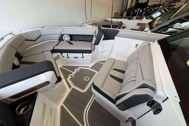Slide: The Image of Luxurious interior of 2026 Monterey Elite 30 OB boat with stylish seating and modern design. - 7