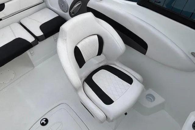 Slide: The Image of White and black seating in 2019 Tahoe 500 TS boat interior. - 18