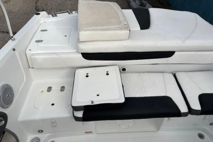 Slide: The Image of 2019 Tahoe 500 TS boat interior with white and black seating. - 22