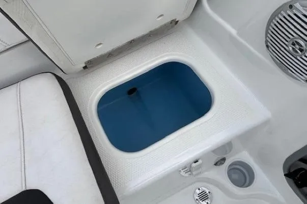 Slide: The Image of 2019 Tahoe 500 TS boat interior with storage compartment and seating. - 24