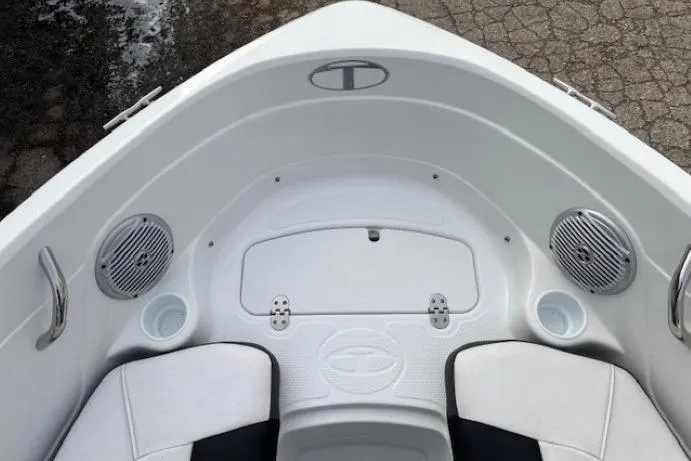 Slide: The Image of 2019 Tahoe 500 TS boat interior with speakers and seating. - 8
