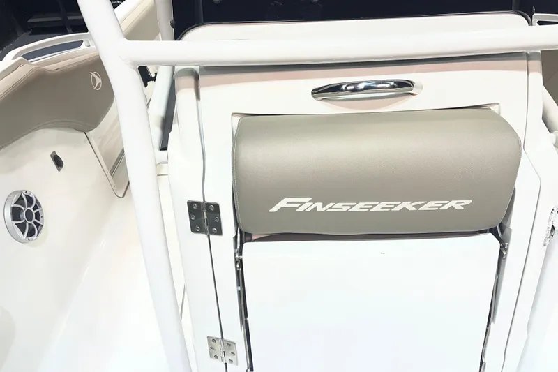 Slide: The Image of 2023 Crownline 220 CC Finseeker boat interior with branded seat and speaker. - 12