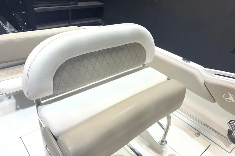 Slide: The Image of 2023 Crownline 220 CC Finseeker boat seat with elegant diamond-pattern upholstery. - 7
