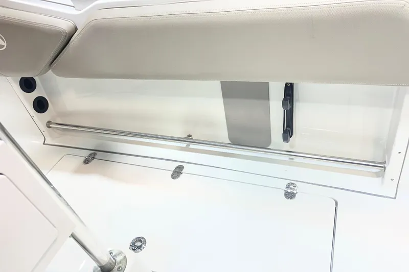 Slide: The Image of 2023 Crownline 220 CC Finseeker interior seating and storage area. - 9