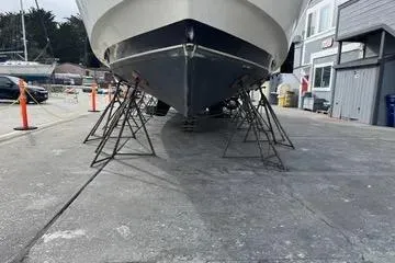 Slide: The Image of 1988 Camargue 48 CPMY yacht on stands in a boatyard. - 47