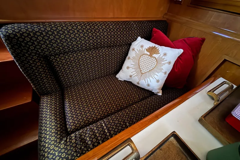 Slide: The Image of Luxurious seating area on 1988 Carmague 48 CPMY yacht with designer cushions. - 7