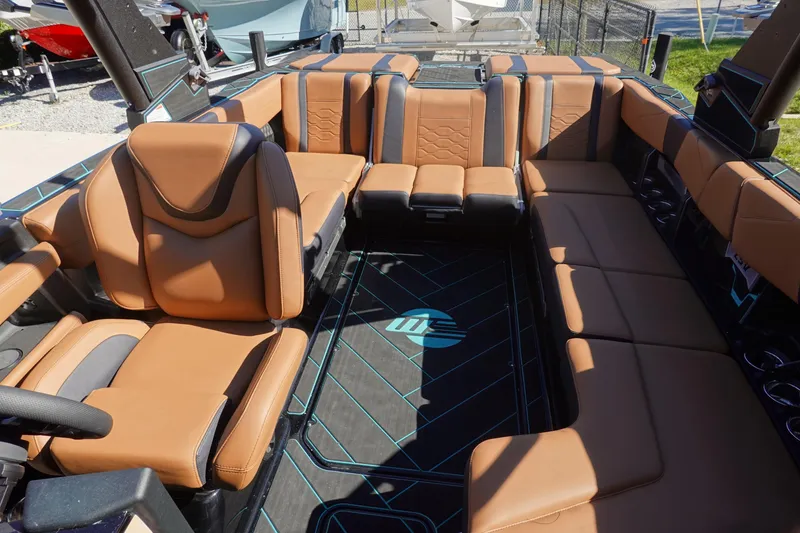 Slide: The Image of 2026 Malibu Wakesetter 23 LSV interior with luxurious tan leather seating. - 11