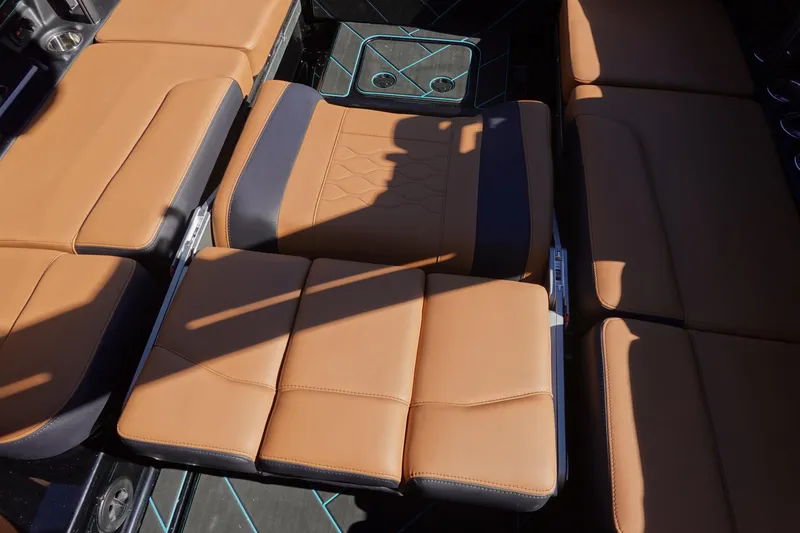 Slide: The Image of 2026 Malibu Wakesetter 23 LSV interior with tan leather seating and sleek design. - 16