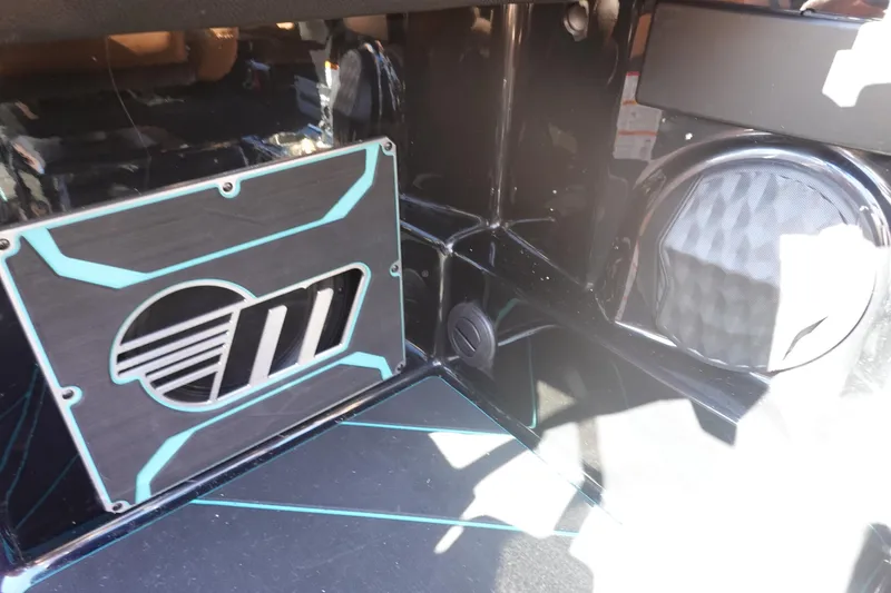 Slide: The Image of 2026 Malibu Wakesetter 23 LSV interior detail with custom audio system. - 26