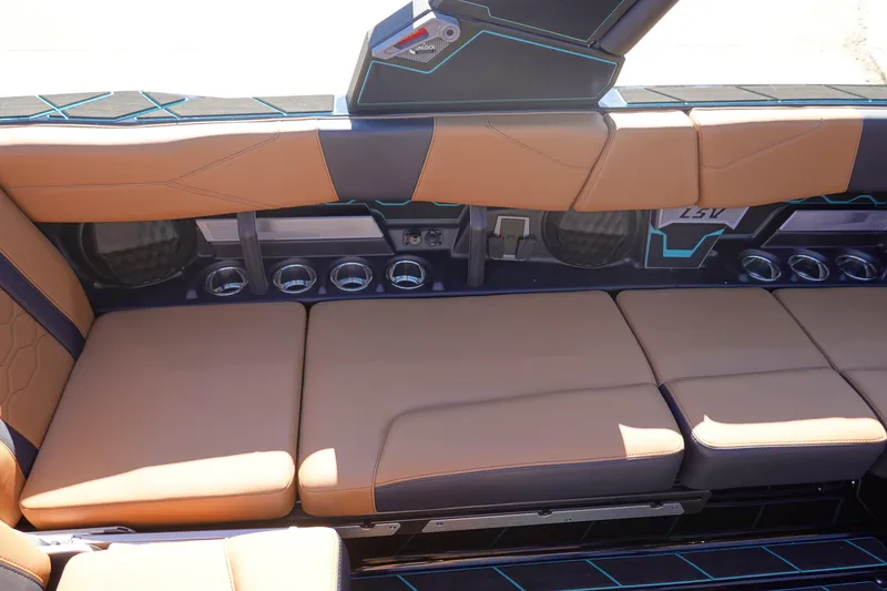 Slide: The Image of 2026 Malibu Wakesetter 23 LSV interior with tan leather seating and modern design elements. - 27