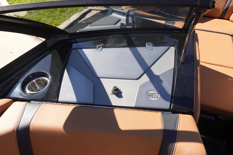 Slide: The Image of 2026 Malibu Wakesetter 23 LSV interior with tan seating and sleek dashboard design. - 32