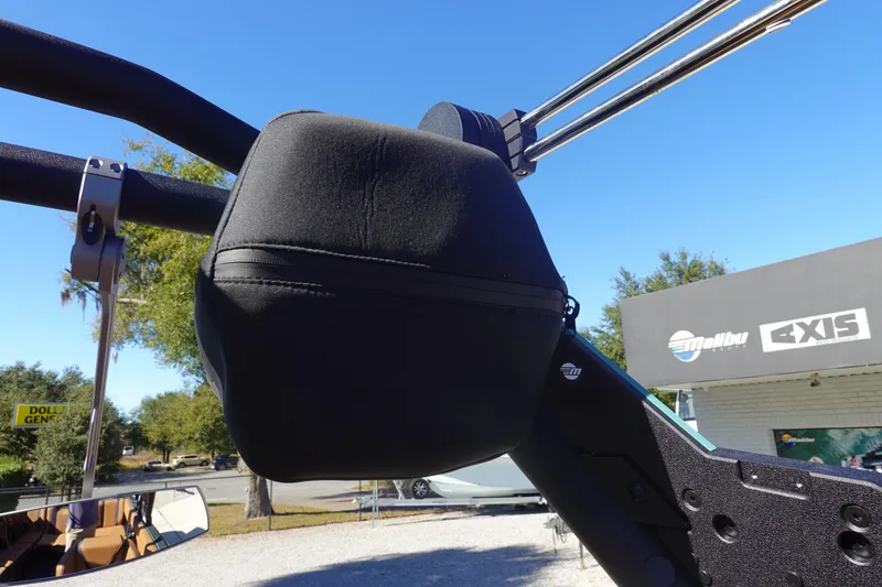 Slide: The Image of 2026 Malibu Wakesetter 23 LSV boat tower with speaker, clear blue sky background. - 42