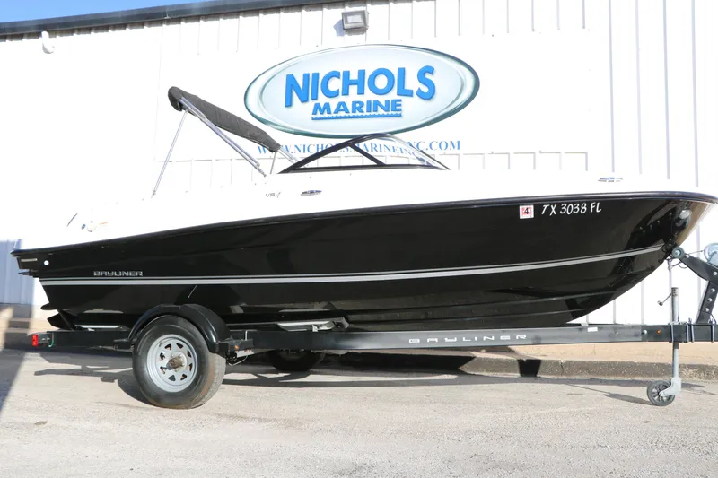 The Image of 2009 Bayliner VR4 Bowrider I/O on trailer at Nichols Marine dealership. - 1