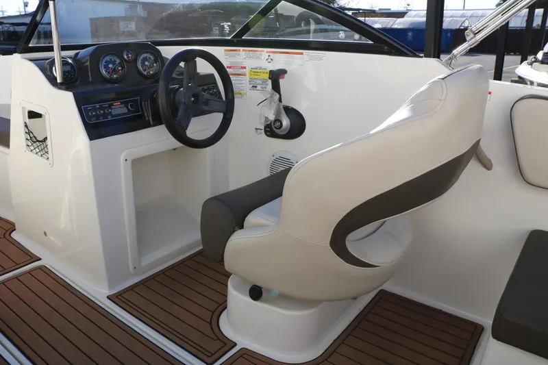 Slide: The Image of 2009 Bayliner VR4 Bowrider I/O interior with steering wheel and seating. - 29