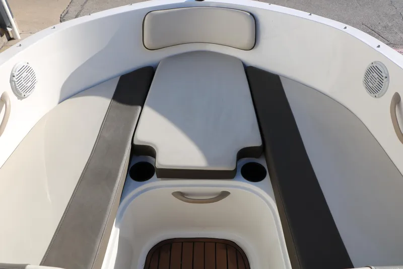 Slide: The Image of 2009 Bayliner VR4 Bowrider I/O interior with cushioned seating and cup holders. - 33