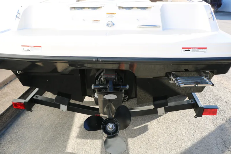 Slide: The Image of Rear view of 2009 Bayliner VR4 Bowrider I/O boat with propeller and trailer. - 36