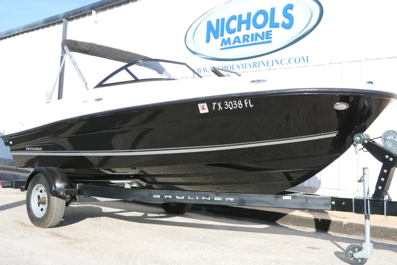 Slide: The Image of 2009 Bayliner VR4 Bowrider I/O on trailer at Nichols Marine dealership. - 4