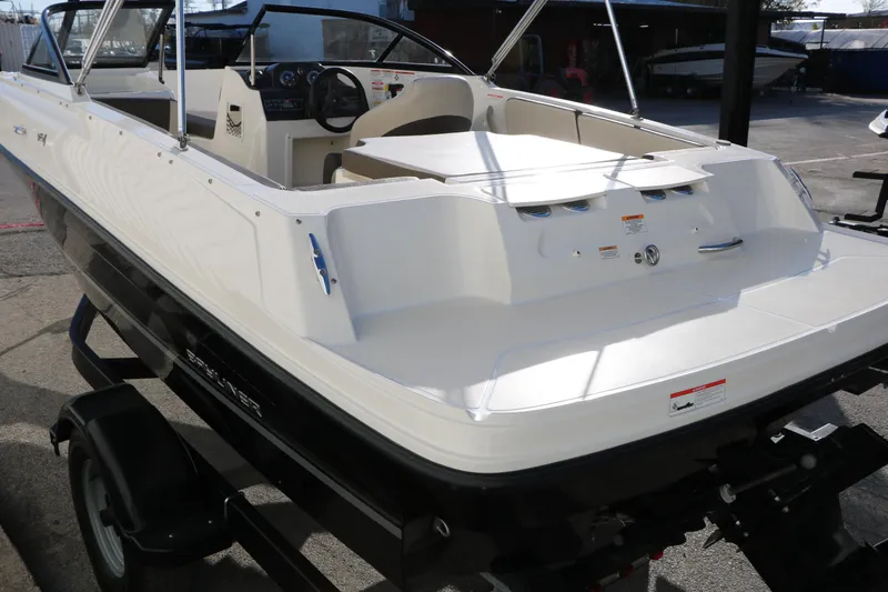 Slide: The Image of 2009 Bayliner VR4 Bowrider I/O boat on trailer, rear view, in outdoor setting. - 8
