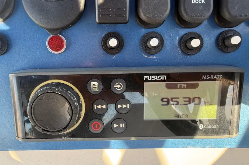 Slide: The Image of Control panel of 2021 Aloha Pontoon Tropical Series 23 with Fusion MS-RA70 radio. - 14
