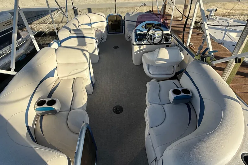 Slide: The Image of 2021 Aloha Pontoon Tropical Series 23 with spacious seating and modern helm. - 19