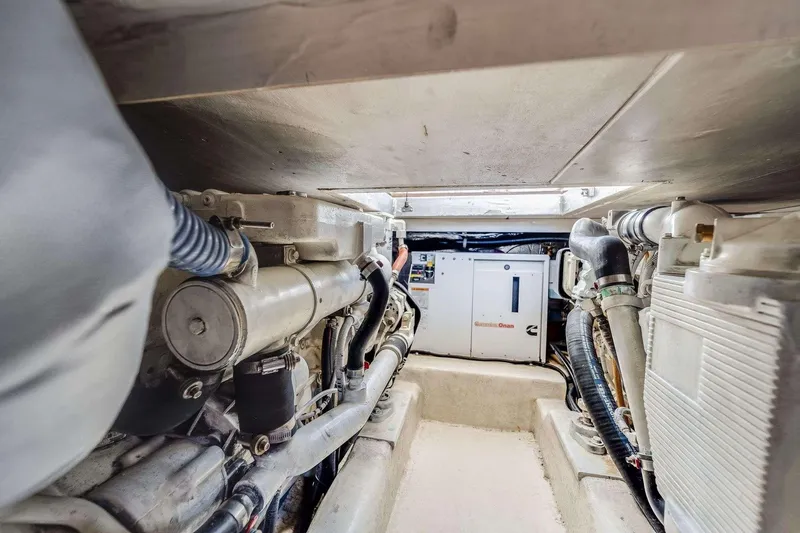Slide: The Image of Engine room of a 2007 Riviera boat featuring Cummins Onan generator. - 5