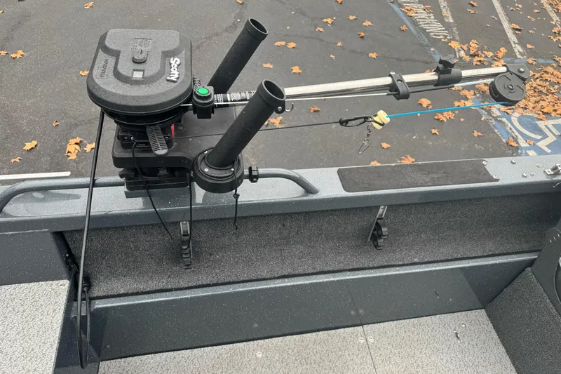 Slide: The Image of 2022 Duckworth 18 Advantage Sport boat with fishing rod holders and downrigger setup. - 10