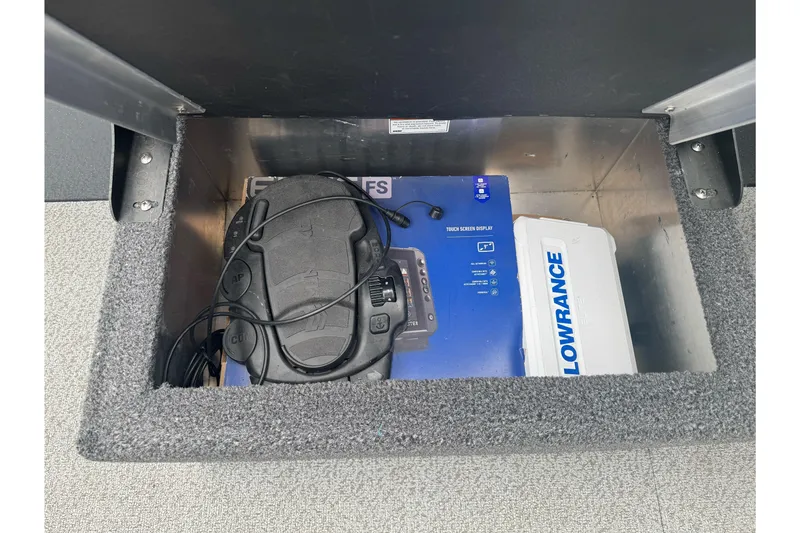 Slide: The Image of Storage compartment in 2022 Duckworth 18 Advantage Sport with Lowrance equipment. - 17