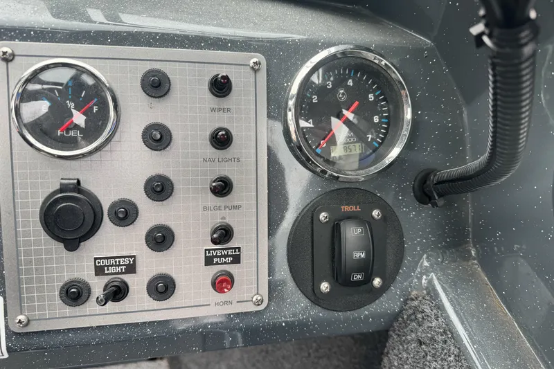 Slide: The Image of Control panel of a 2022 Duckworth 18 Advantage Sport boat with gauges and switches. - 20