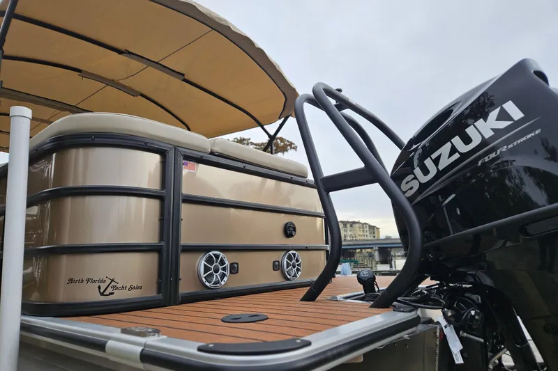 Slide: The Image of 2026 Bentley Pontoons Legacy 243 Cruise with Suzuki engine, featuring a sleek design and spacious deck. - 4