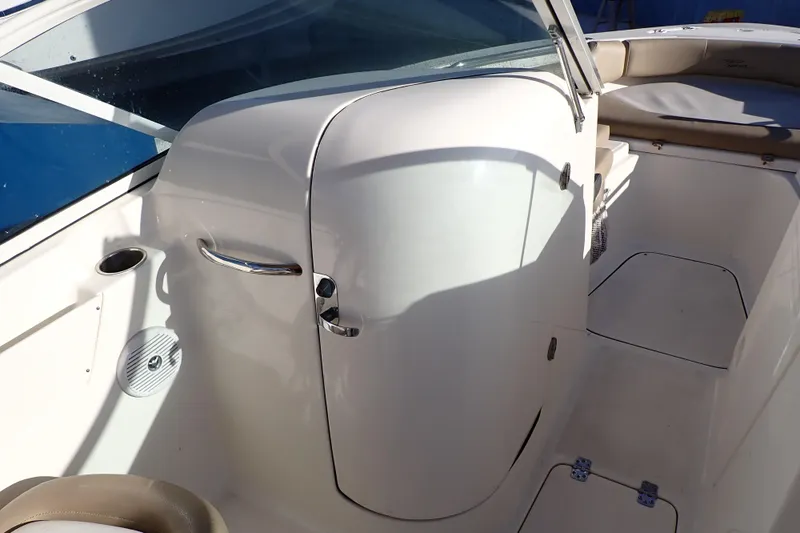 Slide: The Image of 2015 Pioneer 222 Venture boat interior with seating and storage compartments. - 10