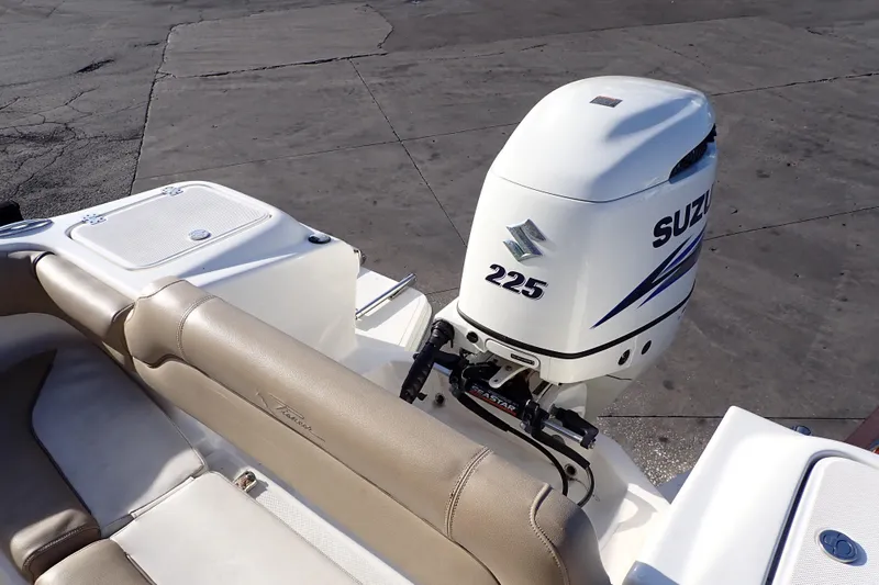 Slide: The Image of 2015 Pioneer 222 Venture boat with Suzuki 225 outboard motor, beige seating. - 12