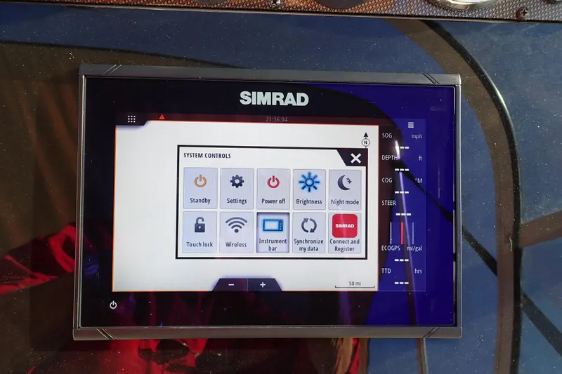 Slide: The Image of Simrad marine display showing system controls on a 2015 Pioneer 222 Venture boat. - 38