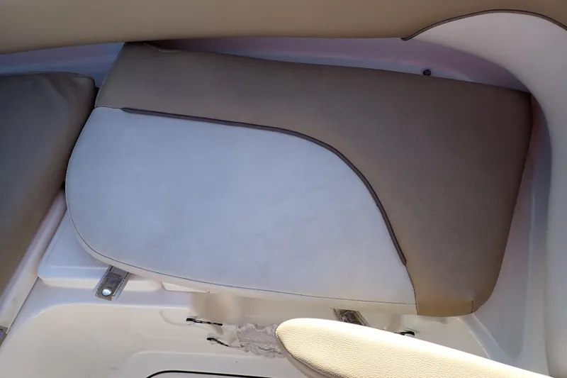 Slide: The Image of 2015 Pioneer 222 Venture boat seat with beige and white upholstery. - 50