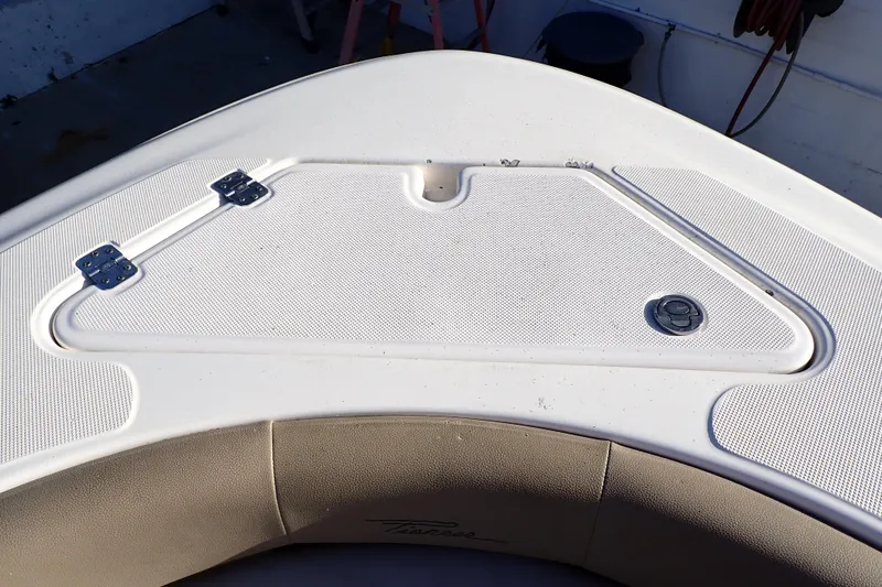 Slide: The Image of Bow storage compartment on a 2015 Pioneer 222 Venture boat. - 52