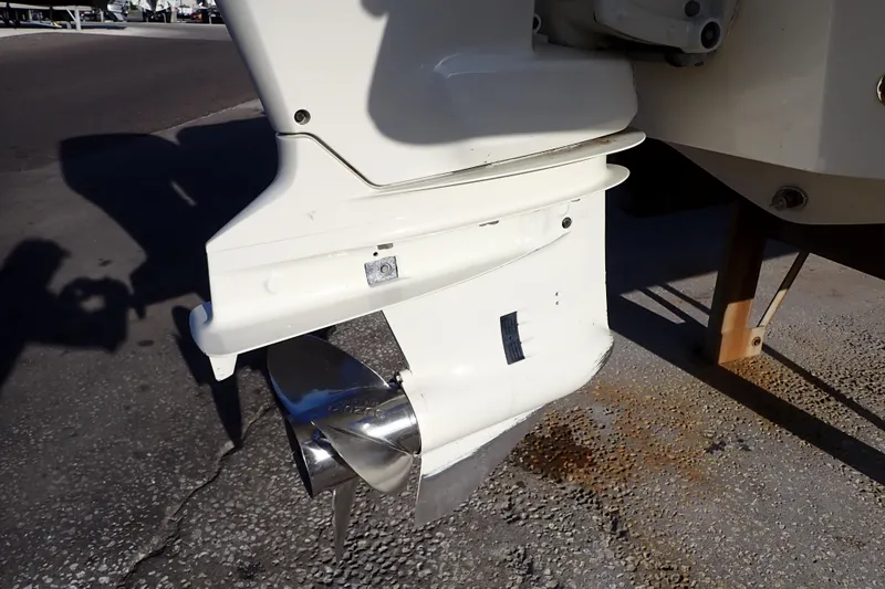 Slide: The Image of Close-up of a 2015 Pioneer 222 Venture boat propeller on a concrete surface. - 55