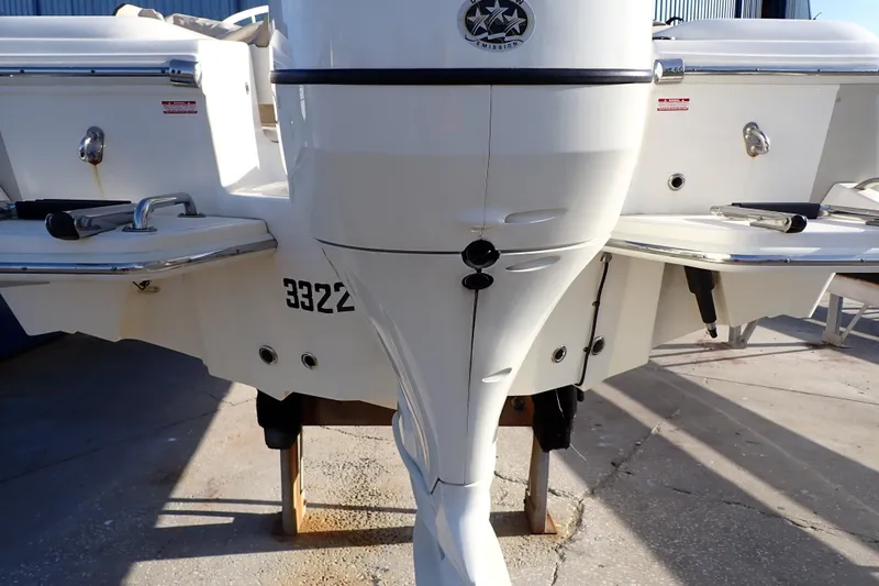 Slide: The Image of 2015 Pioneer 222 Venture boat stern view with outboard motor and swim platforms. - 57