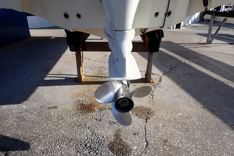 Slide: The Image of Propeller of a 2015 Pioneer 222 Venture boat on a concrete surface. - 58
