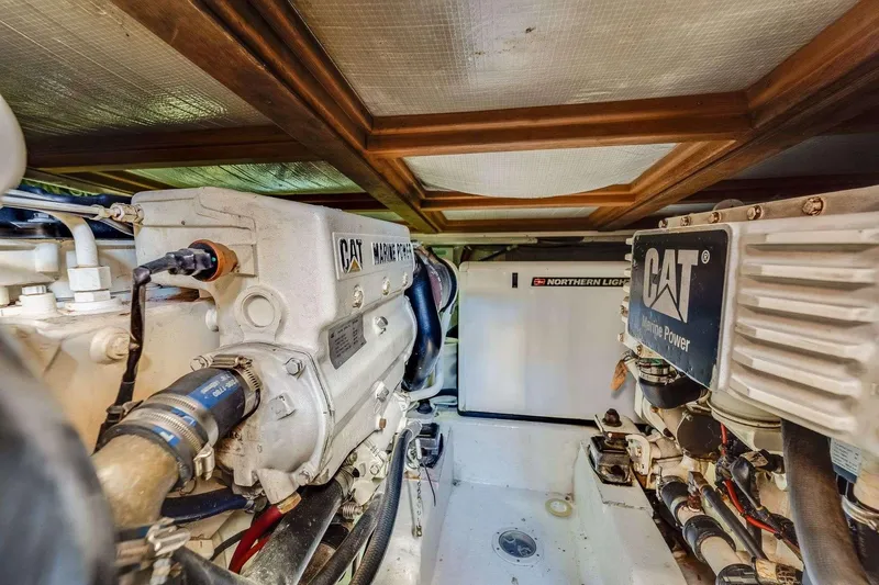 Slide: The Image of Engine room of 2004 Riviera Convertible with CAT Marine Power engines. - 22