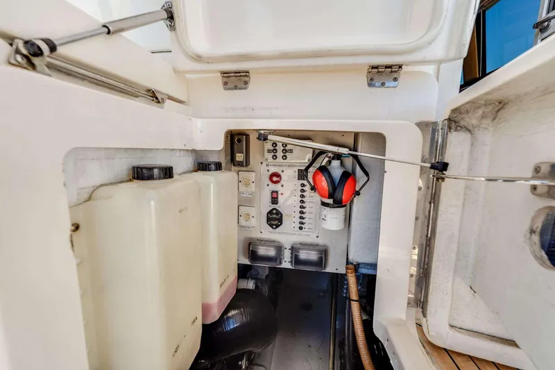 Slide: The Image of 2004 Riviera Convertible control panel with safety gear and storage compartments. - 24