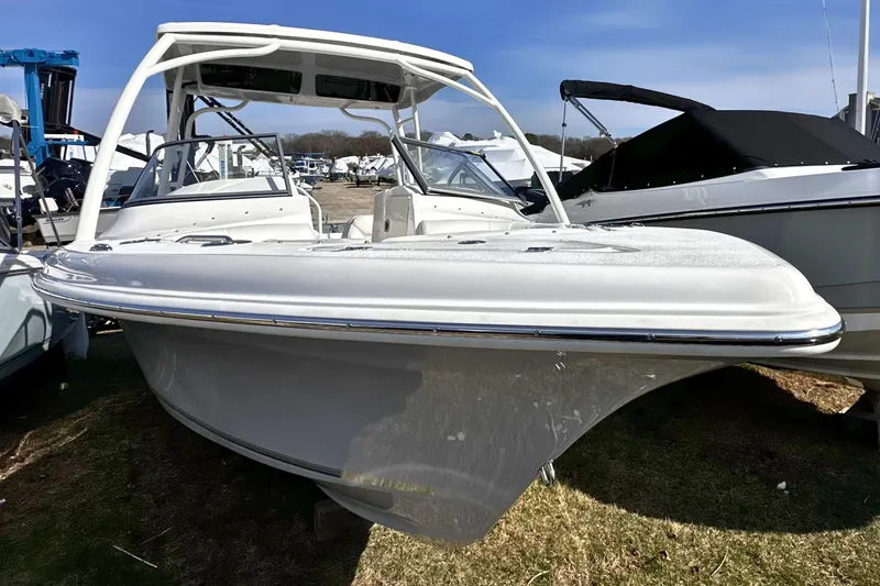 Slide: The Image of 2026 Key West 239 DFS boat displayed outdoors on grass. - 27