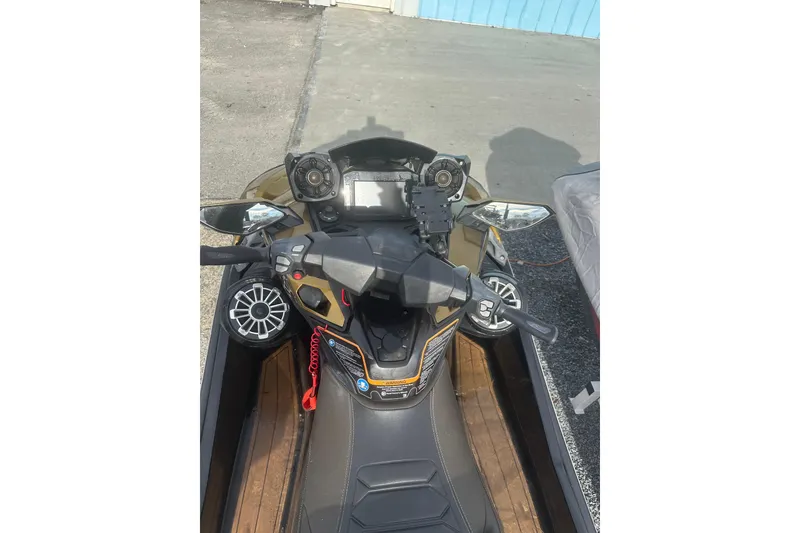 Slide: The Image of 2023 Kawasaki Jetski Ultra 310LX dashboard and controls, featuring advanced technology and sleek design. - 5