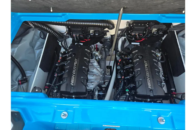 Slide: The Image of 2023 Yamaha Boats 222XD engine compartment with dual high-output engines. - 26