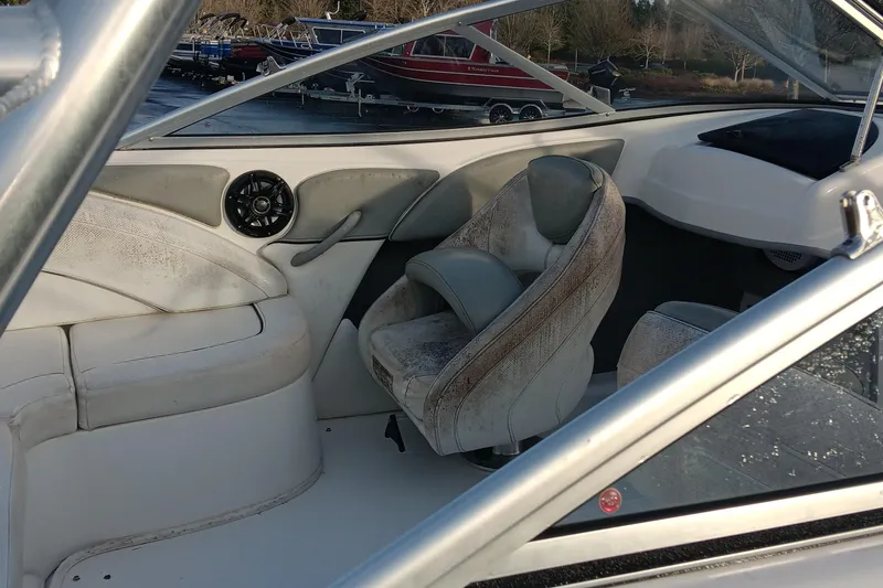 Slide: The Image of Interior of 2013 Bayliner 215 Bowrider boat with seating and speaker. - 15