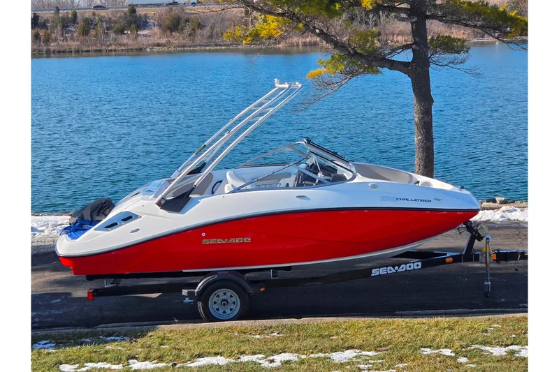 The Image of 2011 Sea-Doo Sport Boats 180 Challenger SE by a scenic lake. - 0
