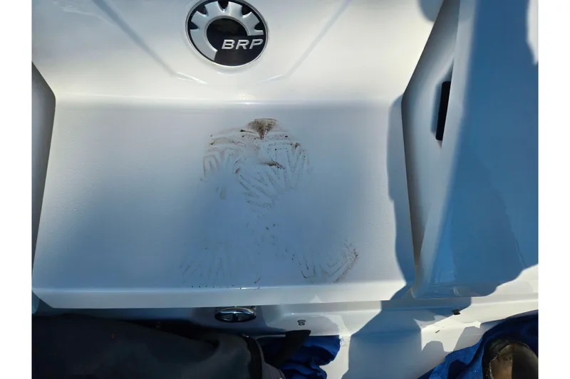 Slide: The Image of 2011 Sea-Doo 180 Challenger SE interior with BRP logo and slight dirt marks. - 10