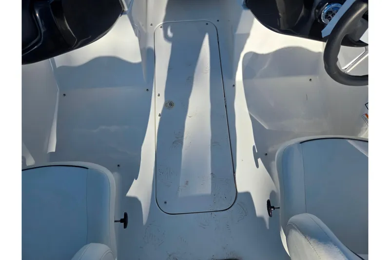 Slide: The Image of Interior view of 2011 Sea-Doo Sport Boats 180 Challenger SE, featuring white seating and floor. - 15