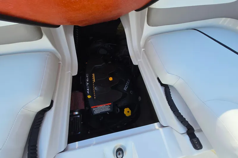 Slide: The Image of Engine compartment of 2011 Sea-Doo Sport Boats 180 Challenger SE, featuring Rotax 4-TEC engine. - 23
