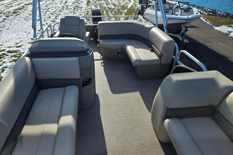 Slide: The Image of 2025 Sun Tracker Party Barge 18 DLX with spacious seating and modern design. - 11