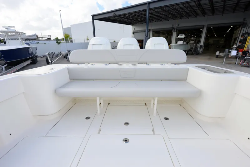 Slide: The Image of 2022 SeaVee 370Z boat interior with seating and storage compartments. - 6