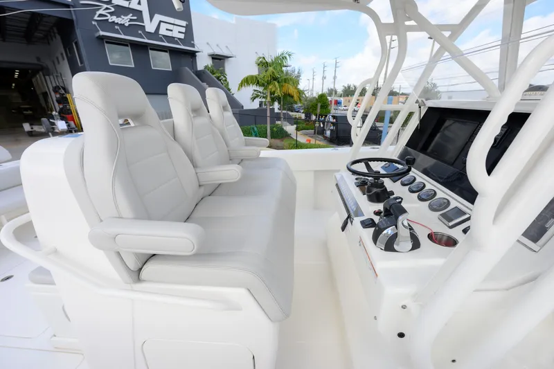 Slide: The Image of 2022 SeaVee 370Z boat cockpit with modern controls and comfortable seating. - 7